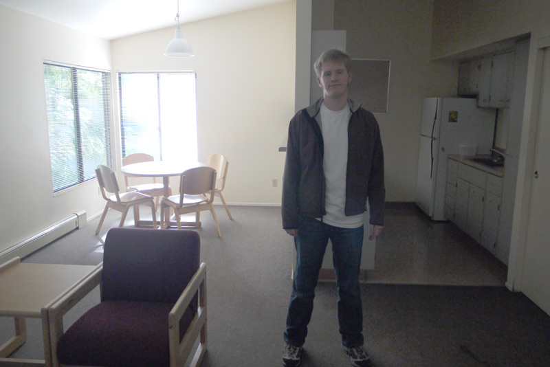 The large common area and kitchen in the on-campus apartment.