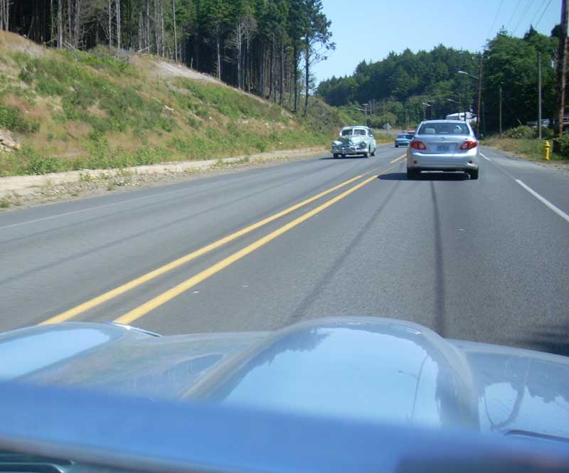 A 40s vintage car seemingly being used as a daily driver. I can't spot the make/model, maybe you guys can.