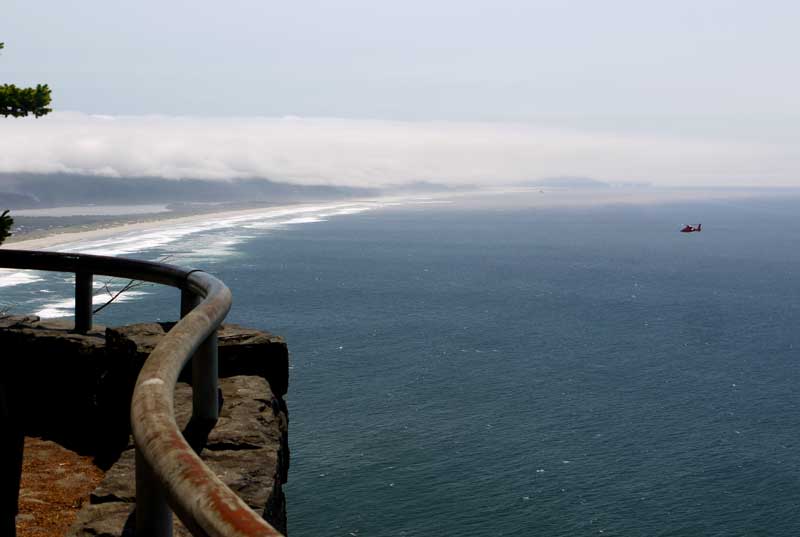 Looking south from Neakhanie Mountain. Coast Guard helo flying by.