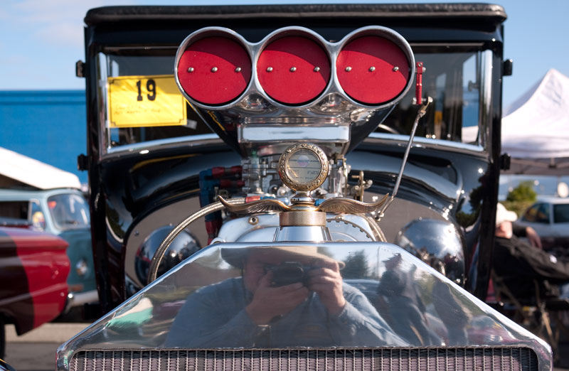 Self-Portrait in Radiator Chrome of outrageous Model T Ford.