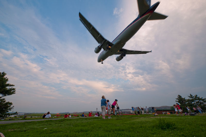 Jet landing above a park in Washington DC.