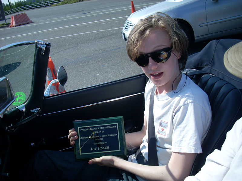 Nick shows off our item we're about to declare at the border: 1st Place Trophy