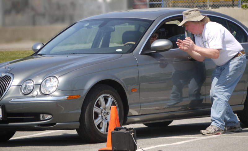 Art coaches a driver newer Jaguar