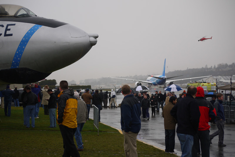 As the 787 heads toward the testing center at the north end of the field, everyone takes a last look at her before heading back to work and out of the rain.