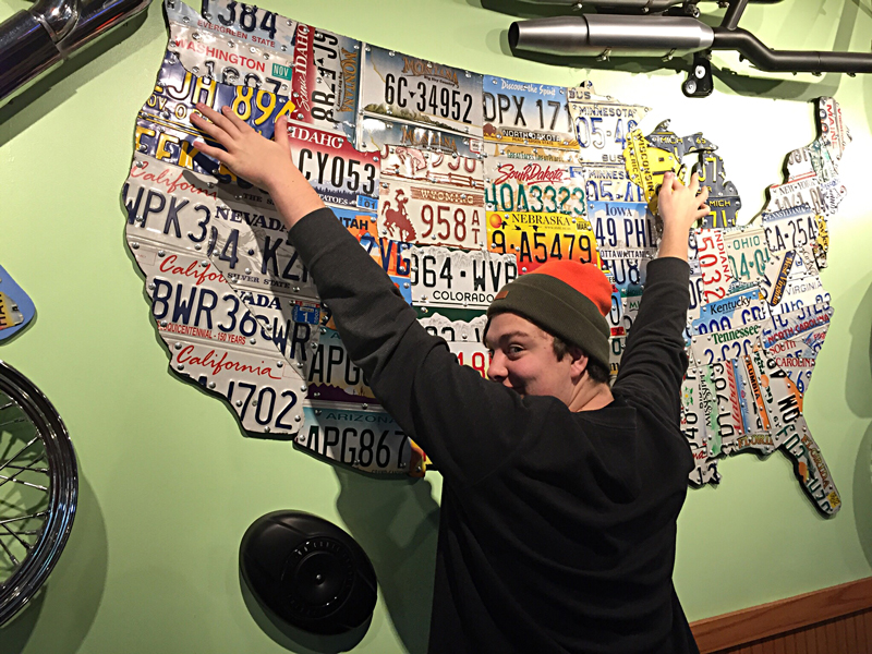 Stewart shows us the end points of our journey on a map made of license plates