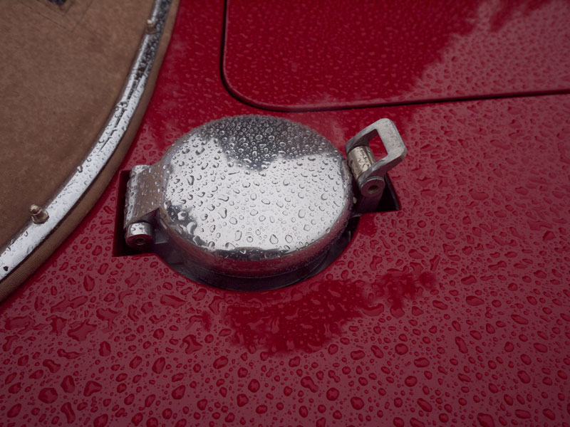 The rain-splattered gas cap of the Apollo GT.