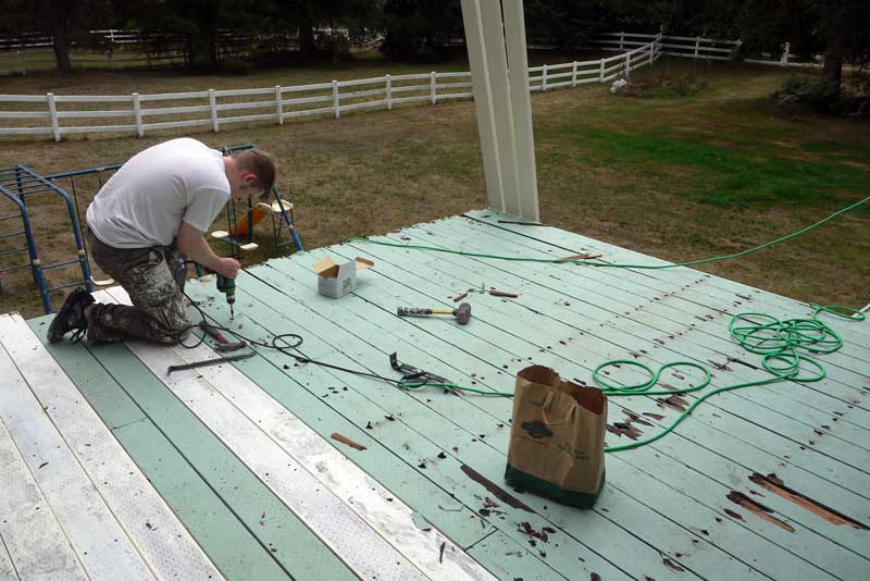 Removing the old wood, laying down the new