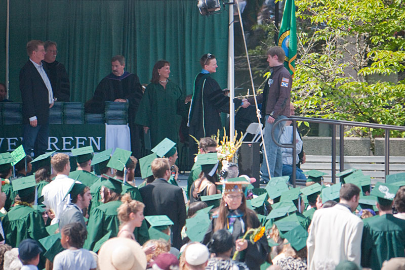 Chris receives his diploma...