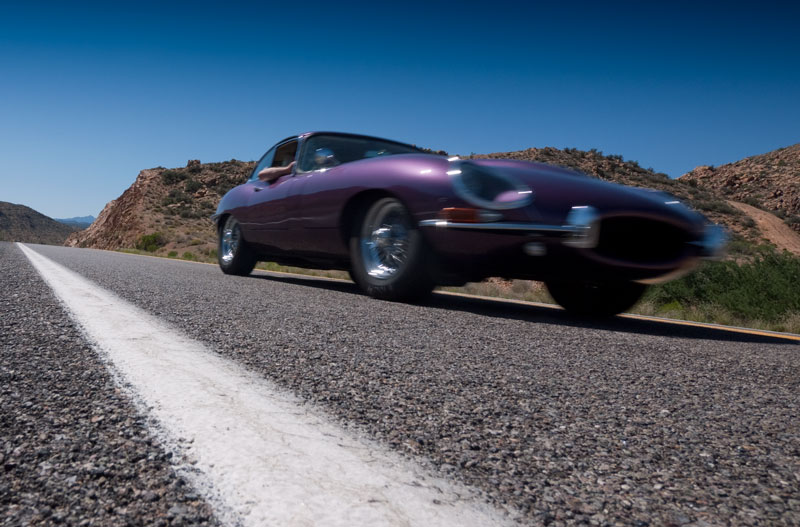 Tweety The Poiple E-type zooms along Route 66